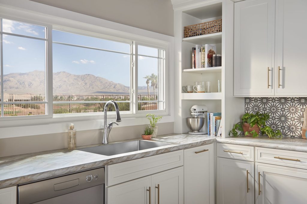 Bay window above luxurious kitchen sink