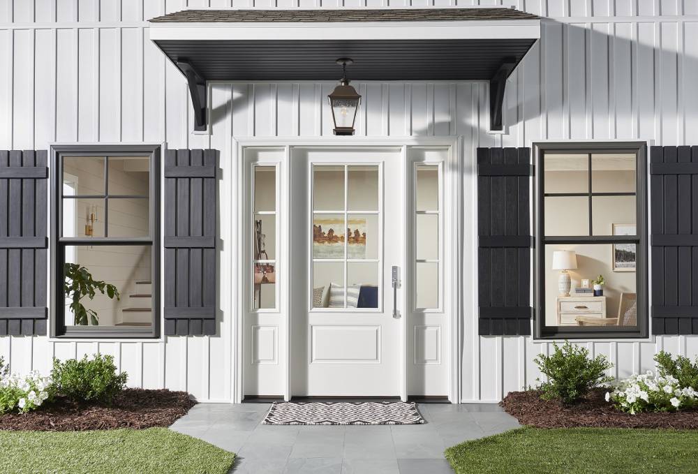 white home with replacement entry door